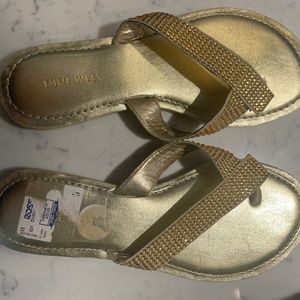 Gold flip flops